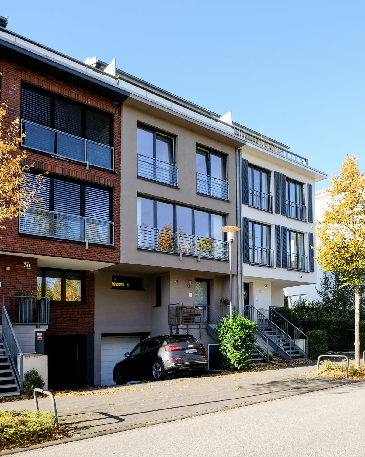 Blick in Salinenstraße Bad Soden a. Ts. - jedes Wohnhaus hat eine andere Fassade, Architektur by Eberhard Horn Designgruppe