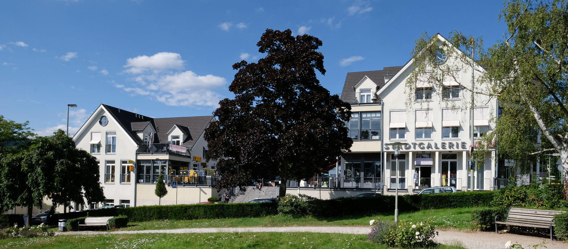 Blick auf Einkaufszentrum von Park aus, Projektplanung Eberhard Horn Prime Estates